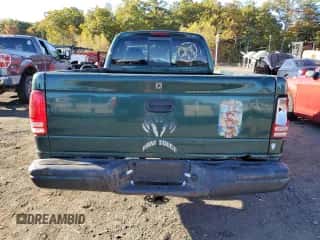 2000 Dodge Dakota z VIN 1B7FL26P0YS764903, wystawiony jako Copart lot #76695194 z przebiegiem 166 471 mil mil oraz Szkoda całkowita • Salvage title. Historia ofert i sprzedaży dostępna na DreamBid. Obrazek 6.