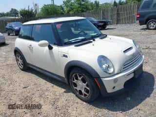 2006 MINI Hardtop S with VIN WMWRE33596TJ37959, listed as a IAAI auction lot 42635457 with 124,440 mi miles and . Bid and sale history available at DreamBid. Image 1.