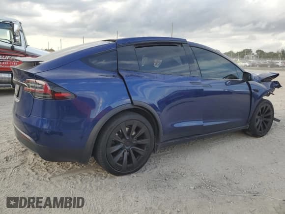 ✅ 2023 Tesla Model X • VIN: 7SAXCBE52PF384559 • Lot: 91859835. Wystawiony na Copart z przebiegiem 24 394 mil. Bezpłatny archiwum sprzedaży aukcyjnych z USA i szczegółowy raport historii pojazdu na DreamBid. Zdjęcie 3.