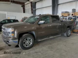 ✅ 2014 Chevrolet Silverado 1500 LT • VIN: 3GCUKREC1EG376986 • Lot: 80687315. Listed on Copart with 123,891 mi. Free auction sales archive from the USA and detailed vehicle history report at DreamBid. Image 1.