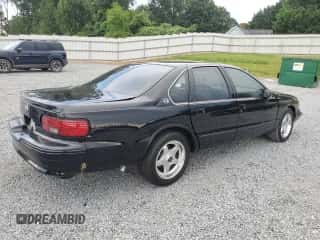 1994 Chevrolet Caprice LS z VIN 1G1BN52P6RR165392, wystawiony jako Copart lot #62899285 z przebiegiem 35 330 mil mil oraz Szkoda całkowita • Salvage title. Historia ofert i sprzedaży dostępna na DreamBid. Obrazek 3.