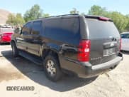 ✅ 2009 Chevrolet Suburban LS • VIN: 1GNFC16J09R300113 • Lot: 42827227. Listed on IAAI with 205,561 mi. Free auction sales archive from the USA and detailed vehicle history report at DreamBid. Image 3.