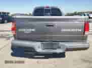 2003 Dodge Dakota Sport z VIN 1D7HL32X63S218920, wystawiony jako Copart lot #76013444 z przebiegiem 142 224 mil mil oraz Czysty tytuł • Clean title. Historia ofert i sprzedaży dostępna na DreamBid. Obrazek 6.