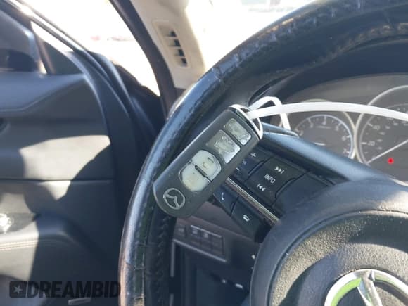 ✅ 2018 Mazda CX-5 Grand Touring • VIN: JM3KFBDM6J0473734 • Лот: 43536049. Опубликован ранее на IAAI с пробегом 124 488 миль. Бесплатный доступ к архиву аукционных продаж из США и подробный отчёт об истории автомобиля на DreamBid. Изображение 11.