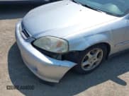 ✅ 1999 Honda Civic EX • VIN: 1HGEJ8148XL016511 • Lot: 42409856. Listed on IAAI with 245,987 mi. Free auction sales archive from the USA and detailed vehicle history report at DreamBid. Image 6.