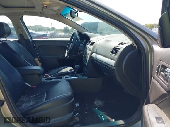 ✅ 2008 Mercury Milan Premier • VIN: 3MEHM08108R601231 • Lot: 43189336. Wystawiony na IAAI z przebiegiem 273 989 mil. Bezpłatny archiwum sprzedaży aukcyjnych z USA i szczegółowy raport historii pojazdu na DreamBid. Zdjęcie 5.