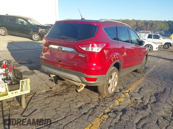 ✅ 2014 Ford Escape Titanium • VIN: 1FMCU0J94EUD14048 • Lot: 43488126. Listed on IAAI with 154,634 mi. Free auction sales archive from the USA and detailed vehicle history report at DreamBid. Image 4.