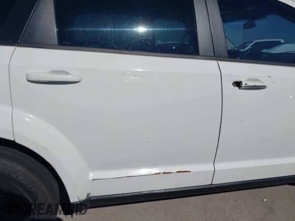 2015 Dodge Journey American Value z VIN 3C4PDCAB0FT540285, wystawiony jako IAAI lot #43610721 z przebiegiem 208 916 mil mil oraz . Historia ofert i sprzedaży dostępna na DreamBid. Obrazek 13.