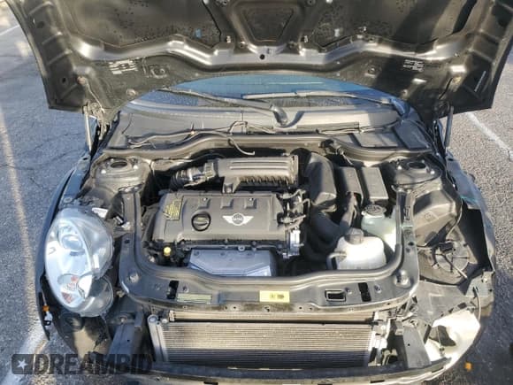 ✅ 2012 MINI Roadster • VIN: WMWSY1C58CT311609 • Lot: 87642395. Listed on Copart with 56,169 mi. Free auction sales archive from the USA and detailed vehicle history report at DreamBid. Image 11.