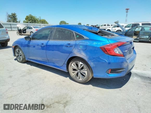 ✅ 2018 Honda Civic EX-L • VIN: 19XFC1F8XJE200204 • Лот: 60295705. Опубликован ранее на Copart с пробегом 40 016 миль. Бесплатный доступ к архиву аукционных продаж из США и подробный отчёт об истории автомобиля на DreamBid. Изображение 2.
