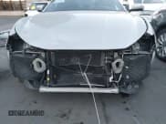 ✅ 2014 Maserati Ghibli • VIN: ZAM57XSA0E1105117 • Lot: 43917494. Listed on IAAI with 41,304 mi. Free auction sales archive from the USA and detailed vehicle history report at DreamBid. Image 6.