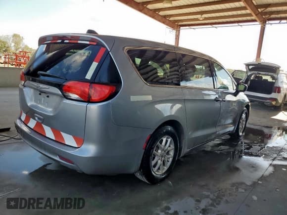 ✅ 2021 Chrysler Voyager LX • VIN: 2C4RC1CG0MR580276 • Lot: 84593825. Listed on Copart with 352,127 mi. Free auction sales archive from the USA and detailed vehicle history report at DreamBid. Image 3.