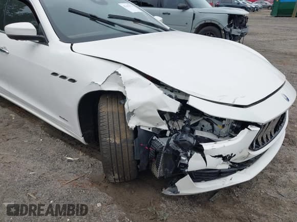 ✅ 2021 Maserati Ghibli S GranLusso • VIN: ZAM57YSL3M1362066 • Лот: 42102072. Опубликован ранее на IAAI с пробегом 55 418 миль. Бесплатный доступ к архиву аукционных продаж из США и подробный отчёт об истории автомобиля на DreamBid. Изображение 6.