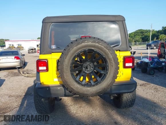 ✅ 2020 Jeep Wrangler Sport S • VIN: 1C4GJXAN7LW215407 • Lot: 42840160. Listed on IAAI with 52,889 mi. Free auction sales archive from the USA and detailed vehicle history report at DreamBid. Image 16.