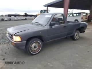 ✅ 1991 Toyota Pickup • VIN: JT4RN81A1M0066772 • Lot: 91201995. Wystawiony na Copart z przebiegiem 206 711 mil. Bezpłatny archiwum sprzedaży aukcyjnych z USA i szczegółowy raport historii pojazdu na DreamBid. Zdjęcie 1.