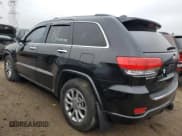 ✅ 2015 Jeep Grand Cherokee Overland • VIN: 1C4RJFCM7FC880093 • Lot: 82241784. Listed on Copart with 158,346 mi. Free auction sales archive from the USA and detailed vehicle history report at DreamBid. Image 2.