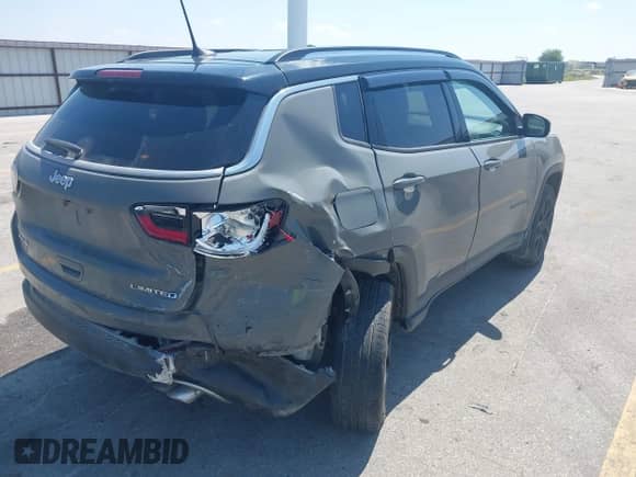 2021 Jeep Compass Limited with VIN 3C4NJDCBXMT596279, listed as a IAAI auction lot 42982613 with 52,886 mi miles and . Bid and sale history available at DreamBid. Image 4.