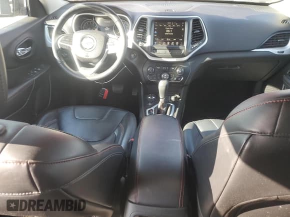 ✅ 2015 Jeep Cherokee Trailhawk • VIN: 1C4PJMBS0FW563072 • Lot: 92593655. Listed on Copart with 64,401 mi. Free auction sales archive from the USA and detailed vehicle history report at DreamBid. Image 8.