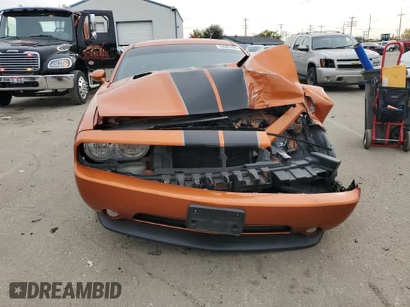 ✅ 2011 Dodge Challenger • VIN: 2B3CJ4DG4BH575131 • Lot: 76595164. Wystawiony na Copart z przebiegiem 98 305 mil. Bezpłatny archiwum sprzedaży aukcyjnych z USA i szczegółowy raport historii pojazdu na DreamBid. Zdjęcie 5.