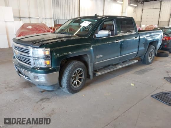 ✅ 2015 Chevrolet Silverado 1500 High Country • VIN: 3GCUKTEJ0FG257243 • Лот: 42064954. Опубликован ранее на IAAI с пробегом 130 320 миль. Бесплатный доступ к архиву аукционных продаж из США и подробный отчёт об истории автомобиля на DreamBid. Изображение 2.