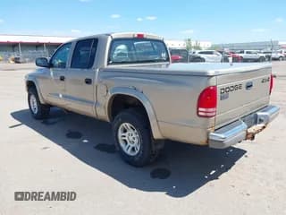 ✅ 2002 Dodge Dakota SLT • VIN: 1B7HG48N32S644931 • Lot: 42320007. Wystawiony na IAAI z przebiegiem 88 367 mil. Bezpłatny archiwum sprzedaży aukcyjnych z USA i szczegółowy raport historii pojazdu na DreamBid. Zdjęcie 3.