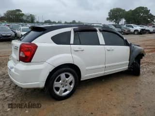 ✅ 2009 Dodge Caliber SXT • VIN: 1B3HB48A29D147588 • Лот: 78863234. Опубликован ранее на Copart с пробегом Не указан. Бесплатный доступ к архиву аукционных продаж из США и подробный отчёт об истории автомобиля на DreamBid. Изображение 3.