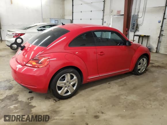 ✅ 2013 Volkswagen Beetle Fender Edition • VIN: 3VWJP7AT4DM670619 • Lot: 43762645. Listed on Copart with 81,229 mi. Free auction sales archive from the USA and detailed vehicle history report at DreamBid. Image 3.