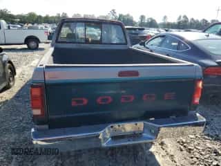 1994 Dodge Dakota z VIN 1B7GL23Y6RS602230, wystawiony jako Copart lot #65988615 z przebiegiem 224 632 mil mil oraz Czysty tytuł • Clean title. Historia ofert i sprzedaży dostępna na DreamBid. Obrazek 6.