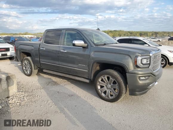 ✅ 2017 GMC Sierra 1500 Denali • VIN: 3GTU2PEJ0HG336373 • Lot: 83965305. Listed on Copart with 79,627 mi. Free auction sales archive from the USA and detailed vehicle history report at DreamBid. Image 4.