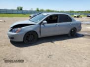 ✅ 2005 Mitsubishi Lancer ES • VIN: JA3AJ26E65U054420 • Lot: 52206935. Listed on Copart with 187,277 mi. Free auction sales archive from the USA and detailed vehicle history report at DreamBid. Image 1.