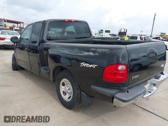 ✅ 2001 Ford F-150 XL • VIN: 1FTZX07201KF98445 • Lot: 42103480. Listed on IAAI with Not provided. Free auction sales archive from the USA and detailed vehicle history report at DreamBid. Image 3.