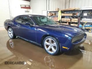 ✅ 2013 Dodge Challenger SXT • VIN: 2C3CDYAG9DH679607 • Lot: 68086724. Wystawiony na Copart z przebiegiem 144 514 mil. Bezpłatny archiwum sprzedaży aukcyjnych z USA i szczegółowy raport historii pojazdu na DreamBid. Zdjęcie 4.