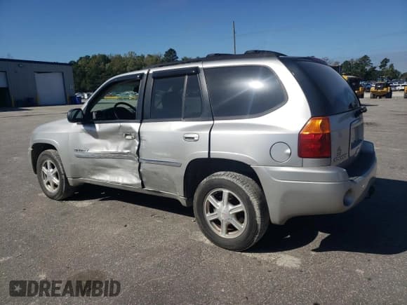 ✅ 2006 GMC Envoy SLT • VIN: 1GKDS13S762352251 • Lot: 85146285. Wystawiony na Copart z przebiegiem 170 587 mil. Bezpłatny archiwum sprzedaży aukcyjnych z USA i szczegółowy raport historii pojazdu na DreamBid. Zdjęcie 2.
