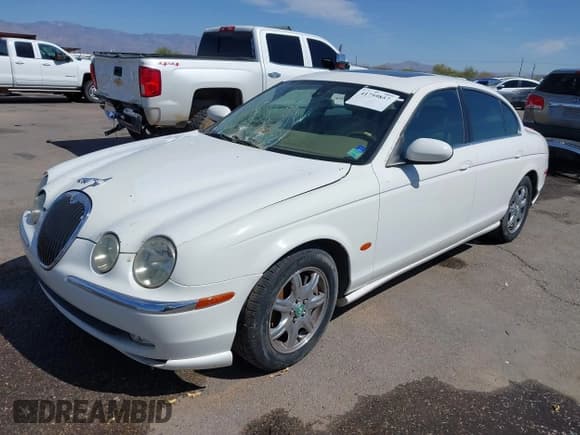 ✅ 2003 Jaguar S-Type • VIN: SAJEA01T13FM63487 • Лот: 41759857. Опубликован ранее на IAAI с пробегом 90 534 миль. Бесплатный доступ к архиву аукционных продаж из США и подробный отчёт об истории автомобиля на DreamBid. Изображение 2.