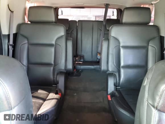 2015 Chevrolet Tahoe LTZ with VIN 1GNSKCKC6FR170659, listed as a Copart auction lot 69412835 with 252,198 mi miles and Salvage title. Bid and sale history available at DreamBid. Image 10.