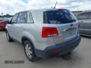 ✅ 2011 Kia Sorento LX • VIN: 5XYKT3A13BG148648 • Lot: 42599939. Listed on IAAI with 86,317 mi. Free auction sales archive from the USA and detailed vehicle history report at DreamBid. Image 3.