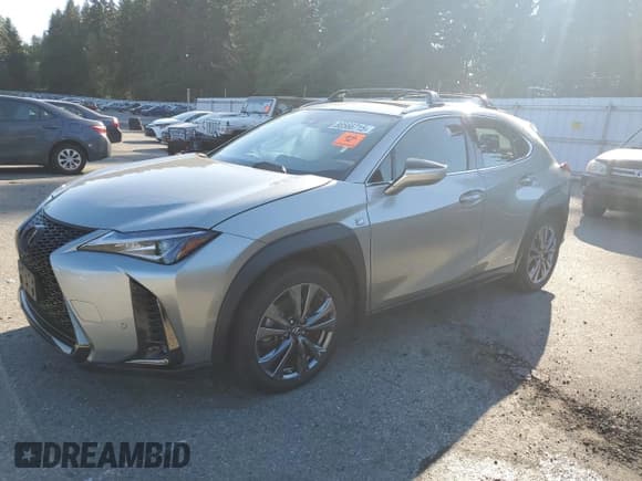 ✅ 2021 Lexus UX 250h F Sport • VIN: JTHR9JBH6M2053395 • Lot: 80566715. Listed on Copart with 31,980 mi. Free auction sales archive from the USA and detailed vehicle history report at DreamBid. Image 1.