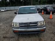 ✅ 1999 Toyota Tacoma • VIN: 4TAVL52N3XZ523937 • Lot: 66933295. Listed on Copart with 284,029 mi. Free auction sales archive from the USA and detailed vehicle history report at DreamBid. Image 5.