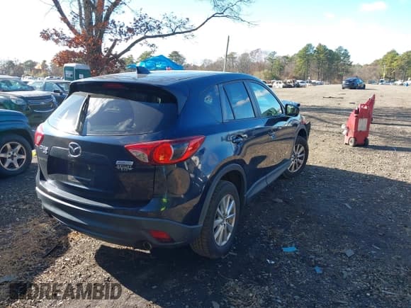 ✅ 2014 Mazda CX-5 Touring • VIN: JM3KE4CY3E0426377 • Lot: 43712899. Wystawiony na IAAI z przebiegiem 96 957 mil. Bezpłatny archiwum sprzedaży aukcyjnych z USA i szczegółowy raport historii pojazdu na DreamBid. Zdjęcie 4.