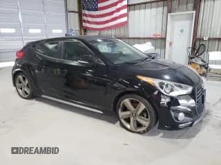 ✅ 2013 Hyundai Veloster Turbo • VIN: KMHTC6AE2DU110723 • Lot: 78014864. Wystawiony na Copart z przebiegiem 131 669 mil. Bezpłatny archiwum sprzedaży aukcyjnych z USA i szczegółowy raport historii pojazdu na DreamBid. Zdjęcie 4.