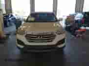 2015 Hyundai Santa Fe z VIN 5XYZTDLB4FG294735, wystawiony jako IAAI lot #43230960 z przebiegiem 169 342 mil mil oraz . Historia ofert i sprzedaży dostępna na DreamBid. Obrazek 13.