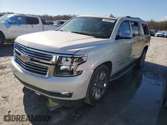 2015 Chevrolet Suburban LTZ z VIN 1GNSKKKC1FR734292, wystawiony jako Copart lot #80950874 z przebiegiem 78 974 mil mil oraz Szkoda całkowita • Salvage title. Historia ofert i sprzedaży dostępna na DreamBid. Obrazek 1.