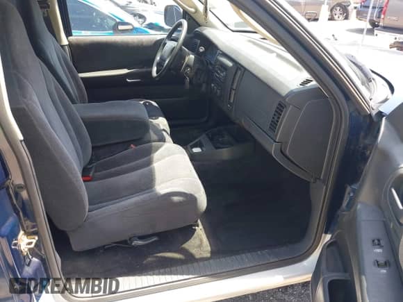 2003 Dodge Dakota SLT with VIN 1D7HL42N83S256346, listed as a IAAI auction lot 42454110 with 75,961 mi miles and . Bid and sale history available at DreamBid. Image 5.