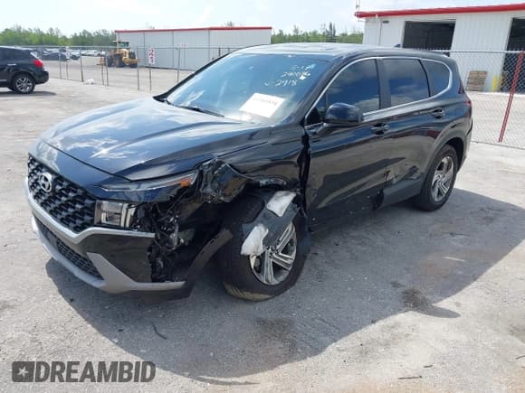 ✅ 2021 Hyundai Santa Fe SE • VIN: 5NMS14AJ0MH332918 • Lot: 42365534. Listed on IAAI with 58,720 mi. Free auction sales archive from the USA and detailed vehicle history report at DreamBid. Image 2.
