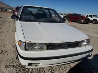 ✅ 1992 Toyota Corolla • VIN: JT2AE94A1N0300157 • Lot: 77783474. Listed on Copart with 180,103 mi. Free auction sales archive from the USA and detailed vehicle history report at DreamBid. Image 5.
