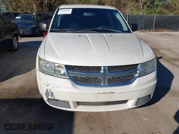 2013 Dodge Journey American Value с VIN 3C4PDCABXDT537214, выставлен на аукционе IAAI как лот 43618834 с пробегом 219 015 миль миль и . История ставок и продаж доступна на DreamBid. Изображение 6.