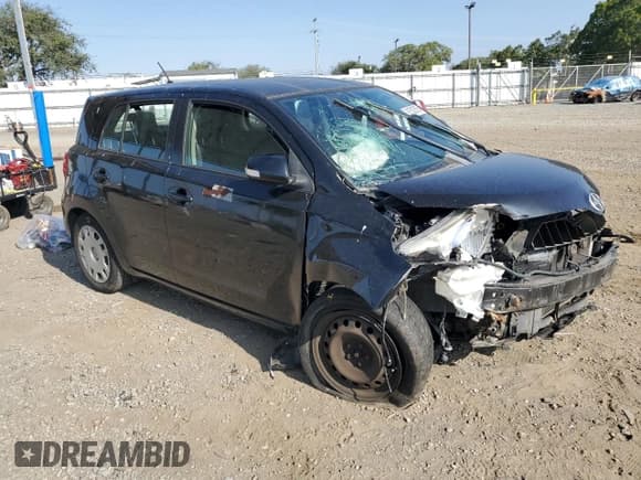 ✅ 2009 Scion xD • VIN: JTKKU10499J048909 • Lot: 91502885. Listed on Copart with 128,936 mi. Free auction sales archive from the USA and detailed vehicle history report at DreamBid. Image 4.