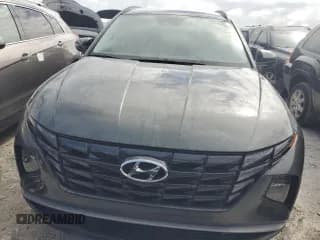 ✅ 2022 Hyundai Tucson Blue • VIN: KM8JBCA13NU078338 • Lot: 76901004. Wystawiony na Copart z przebiegiem 37 351 mil. Bezpłatny archiwum sprzedaży aukcyjnych z USA i szczegółowy raport historii pojazdu na DreamBid. Zdjęcie 5.