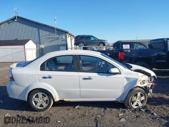 ✅ 2009 Chevrolet Aveo 2LT • VIN: KL1TG56E69B316889 • Lot: 41851903. Wystawiony na IAAI z przebiegiem 142 812 mil. Bezpłatny archiwum sprzedaży aukcyjnych z USA i szczegółowy raport historii pojazdu na DreamBid. Zdjęcie 14.