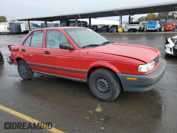 ✅ 1992 Nissan Sentra E • VIN: JN1EB31P1NU121278 • Lot: 84889294. Listed on Copart with 128,445 mi. Free auction sales archive from the USA and detailed vehicle history report at DreamBid. Image 4.